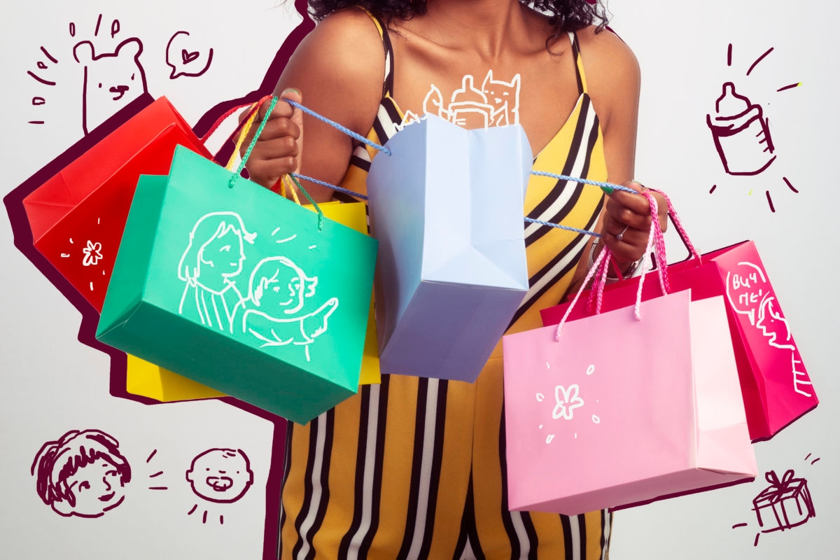 Be excited by new goodies! Happy shopper woman looking inside shopping bags.
