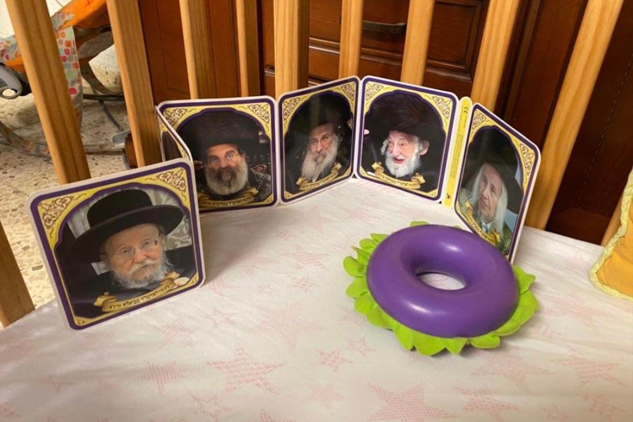 board book with rabbis in a crib