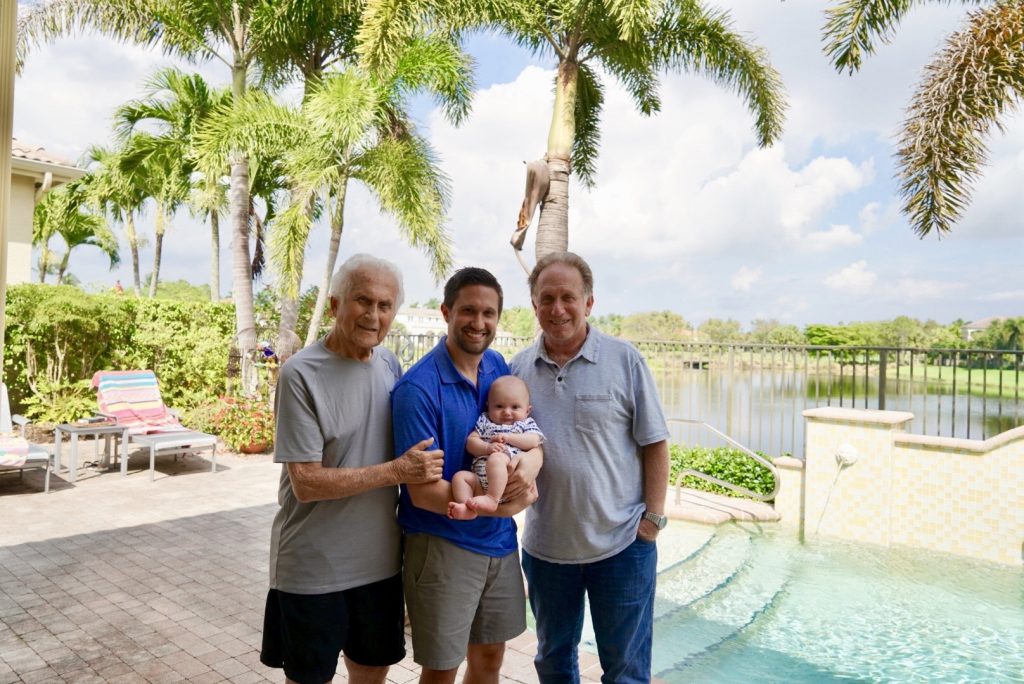 A photo of Tyler, his son, and his grandfather.