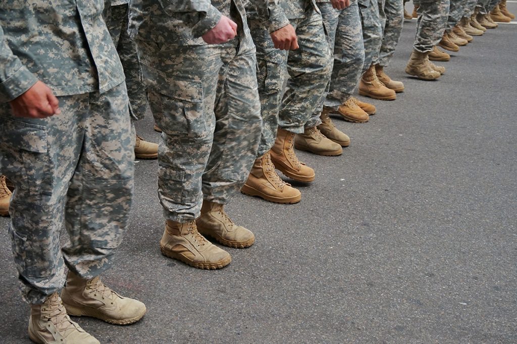 soldiers lined up, uniforms and boots.