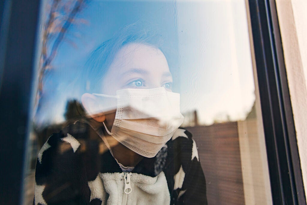 girl looking out the window