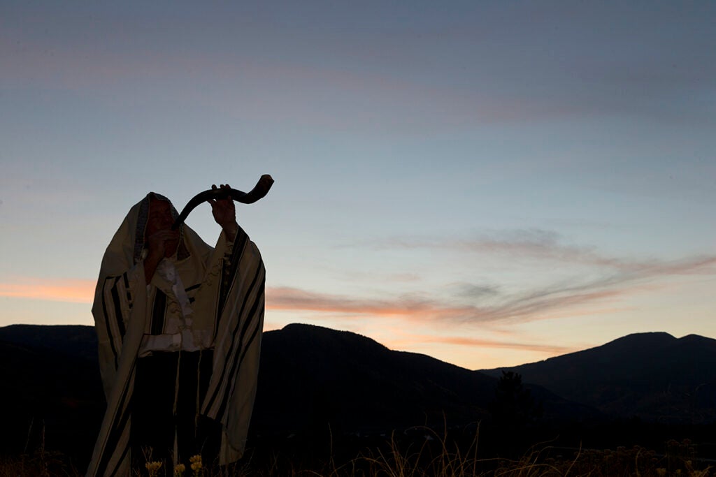 cantor blowing a shofar