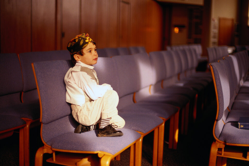 Boy Sitting in a Jewish Temple