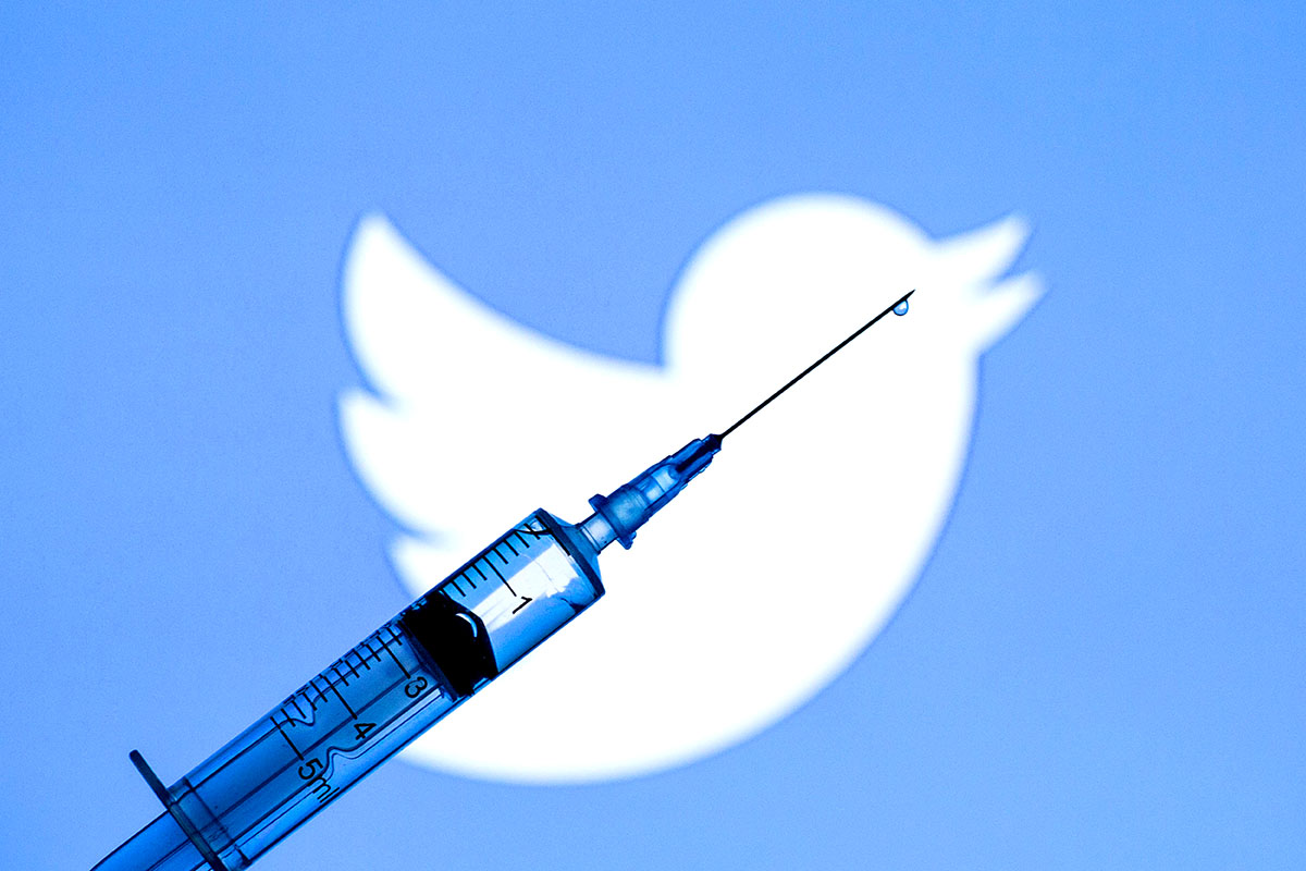 twitter logo and medical syringe
