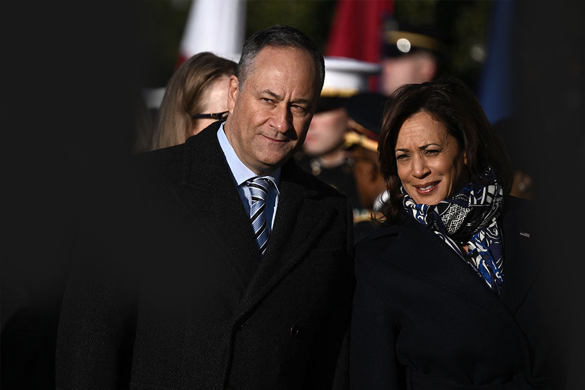 US Vice President Kamala Harris and Second Gentleman Doug Emhoff wait for the welcoming ceremony for French President Emmanuel Macron and his wife Brigitte Macron at the White House in Washington, DC, on December 1, 2022.