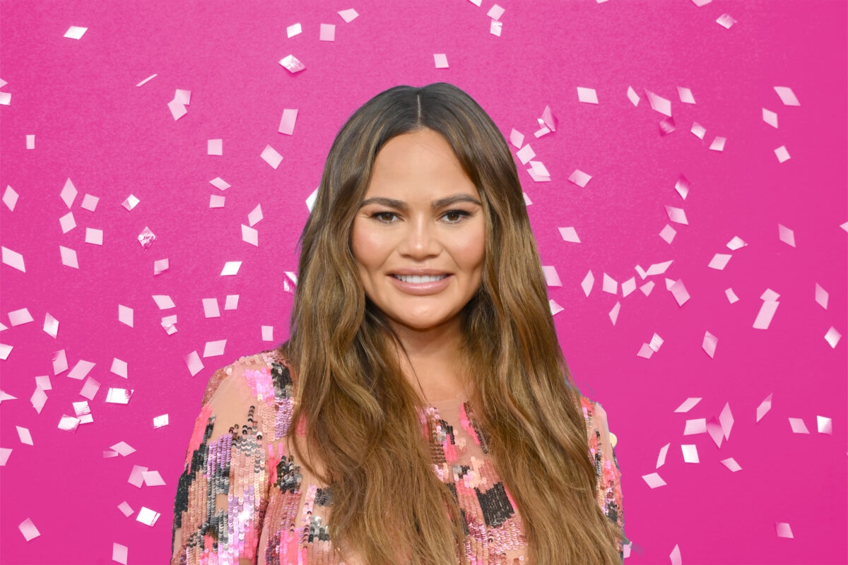 Chrissy Teigen on a background of confetti