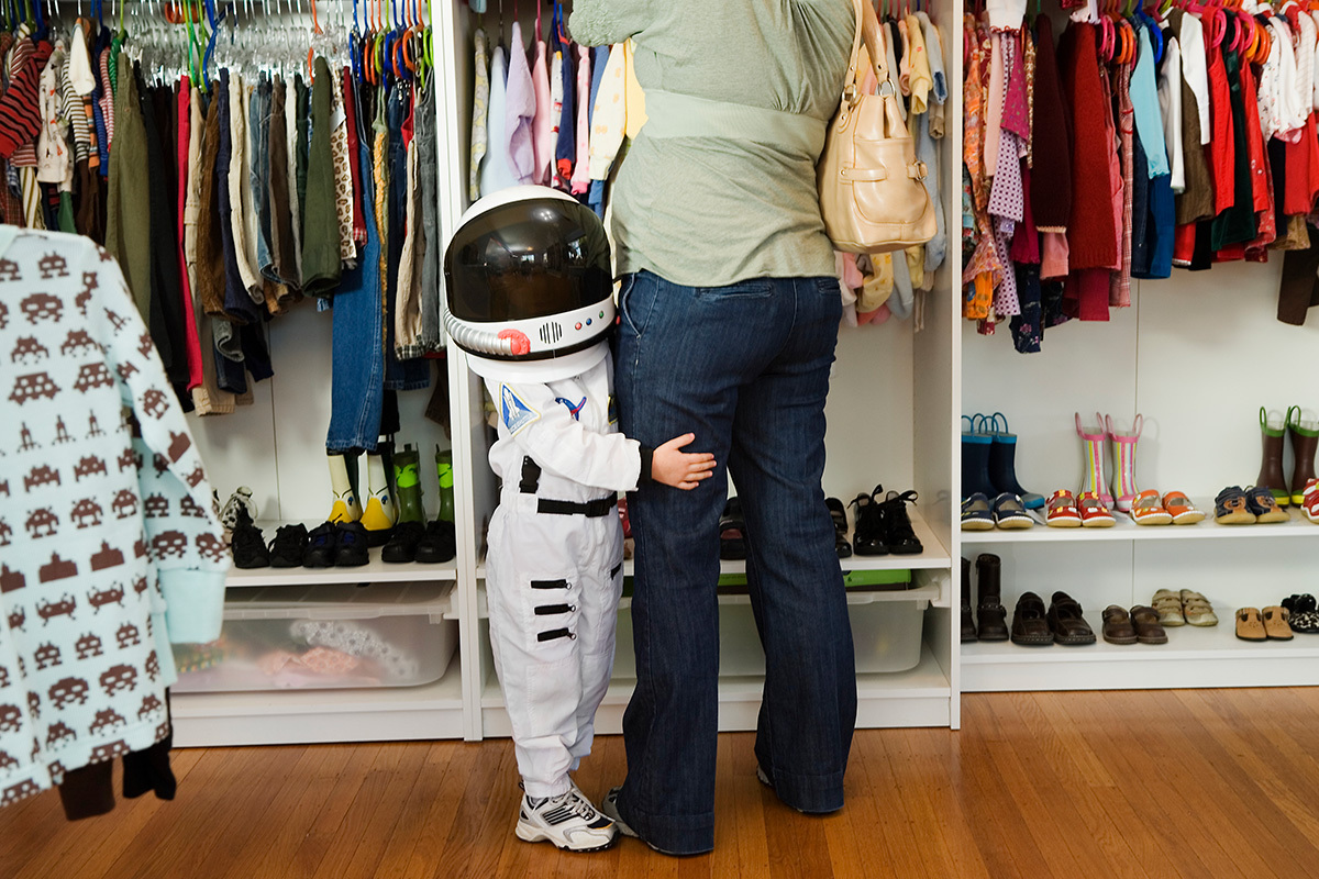 spacesuit costume little kid shopping with mom