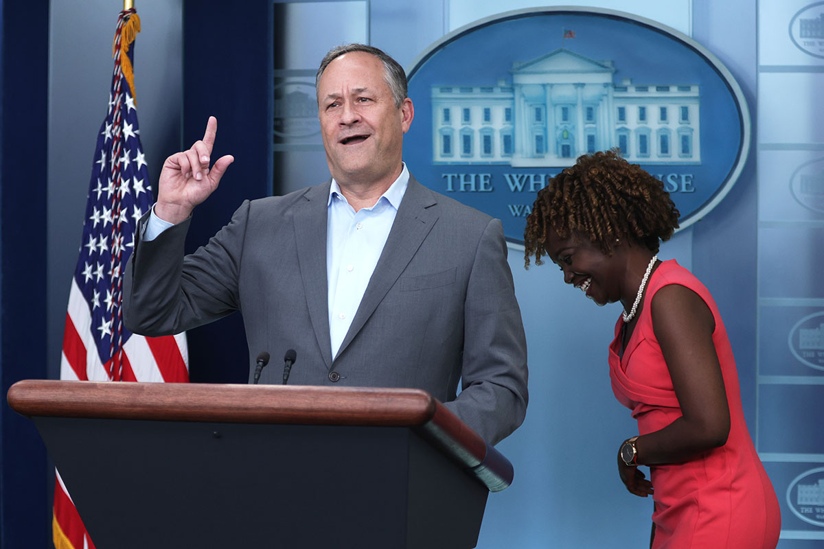 U.S. second gentleman Doug Emhoff tells a joke as White House Press Karine Jean-Pierre reacts in the James S. Brady Press Briefing Room of the White House on June 15, 2023 in Washington, DC. Emhoff came to the briefing room to tell a couple of jokes to mark Father’s Day.