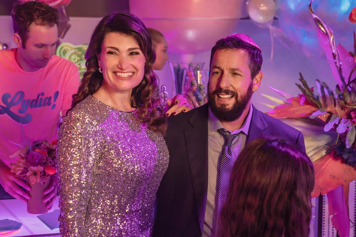 You Are SO Not Invited To My Bat Mitzvah. (L to R) Idina Menzel as Bree Friedman and Adam Sandler as Danny Friedman in You Are SO Not Invited To My Bat Mitzvah.