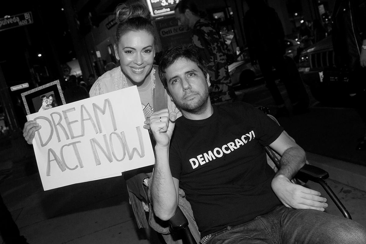 LOS ANGELES, CA - JANUARY 03: Alyssa Milano (L) and Ady Barkan attend the Los Angeles Supports a Dream Act Now! protest at the office of California Senator Dianne Feinstein on January 3, 2018 in Los Angeles, California.