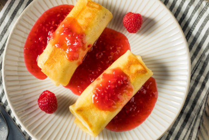 Sweet Homemade Cheese Blintzes with Raspberry Sauce