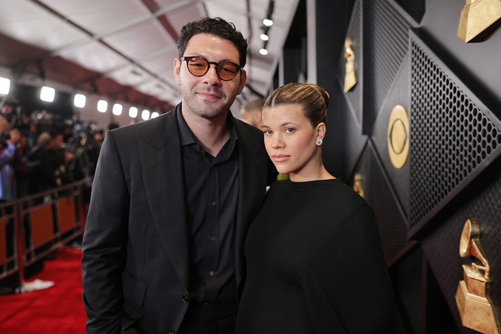 LOS ANGELES, CALIFORNIA - FEBRUARY 04: (L-R) Elliot Grainge and Sofia Richie Grainge attend the 66th GRAMMY Awards at Crypto.com Arena on February 04, 2024 in Los Angeles, California.
