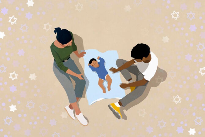 Parents watching baby son sleeping on blanket against beige background