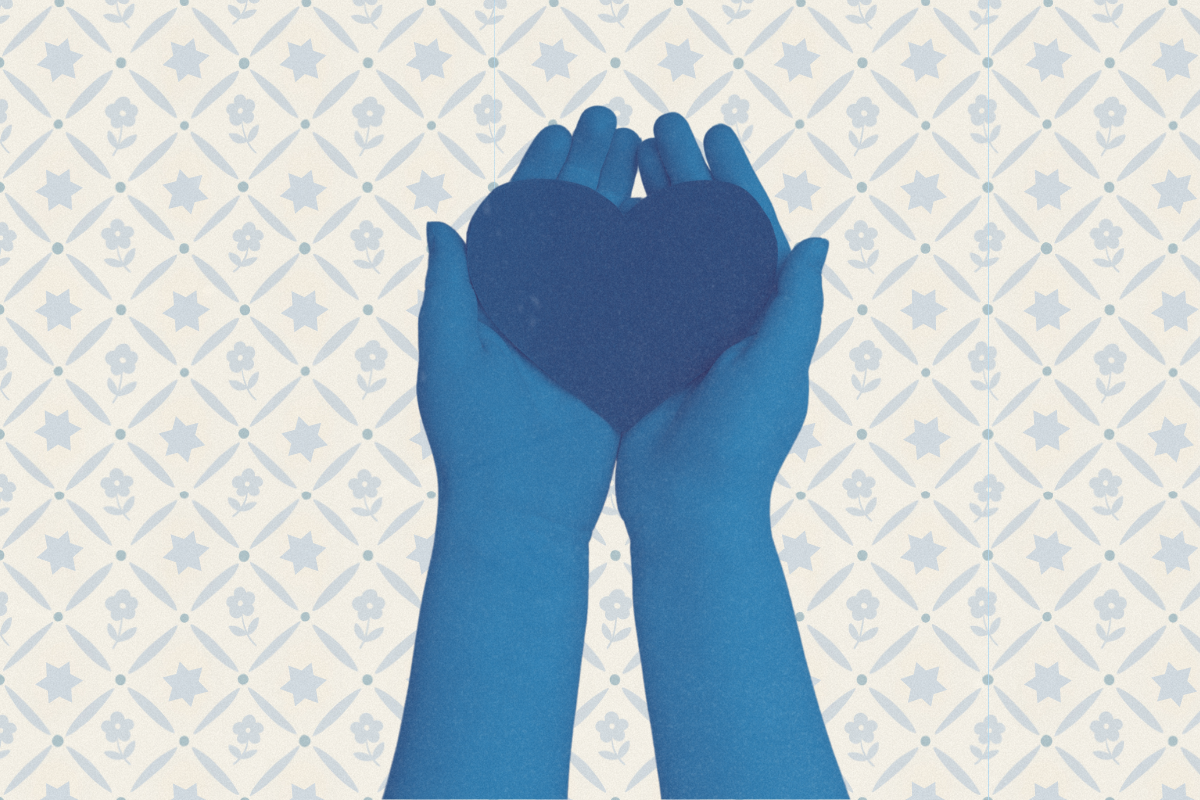 A blue and white vintage hand drawn geometric lattice print, with flowers and Jewish stars, behind a photograph of two hands holding a heart.