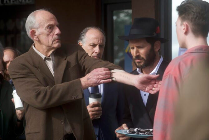 Christopher Llyod plays Holocaust survivor Sol, shows his tattoo from Auschwitz to a young Neo-Nazi.