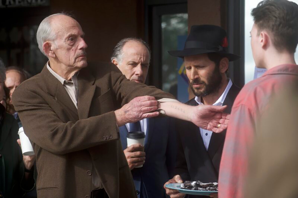 Christopher Llyod plays Holocaust survivor Sol, shows his tattoo from Auschwitz to a young Neo-Nazi.