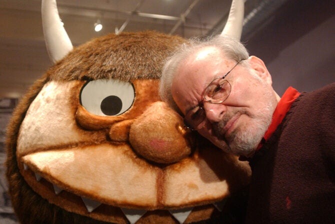 Maurice Sendak lovingly leaning on Bruno, Wild Thing with Horns from "Where the Wild Things Are" at an opening of an exhibition dedicated to the author in January of 2002