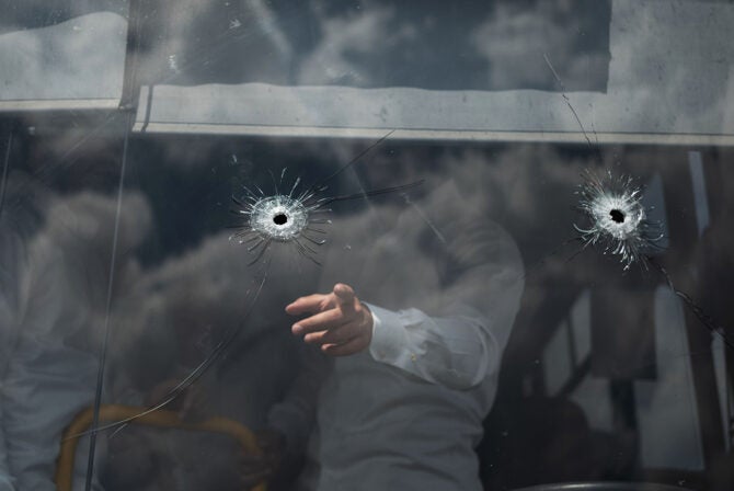 08 September 2025, Israel, Jerusalem: Gunshots are seen on a wind-shield of a bus at the bus stop where a shooting attack took place in Jerusalem. The Israeli emergency medical service reported that four victims were pronounced dead at the scene in north Jerusalem, while one died of her injuries later in hospital.