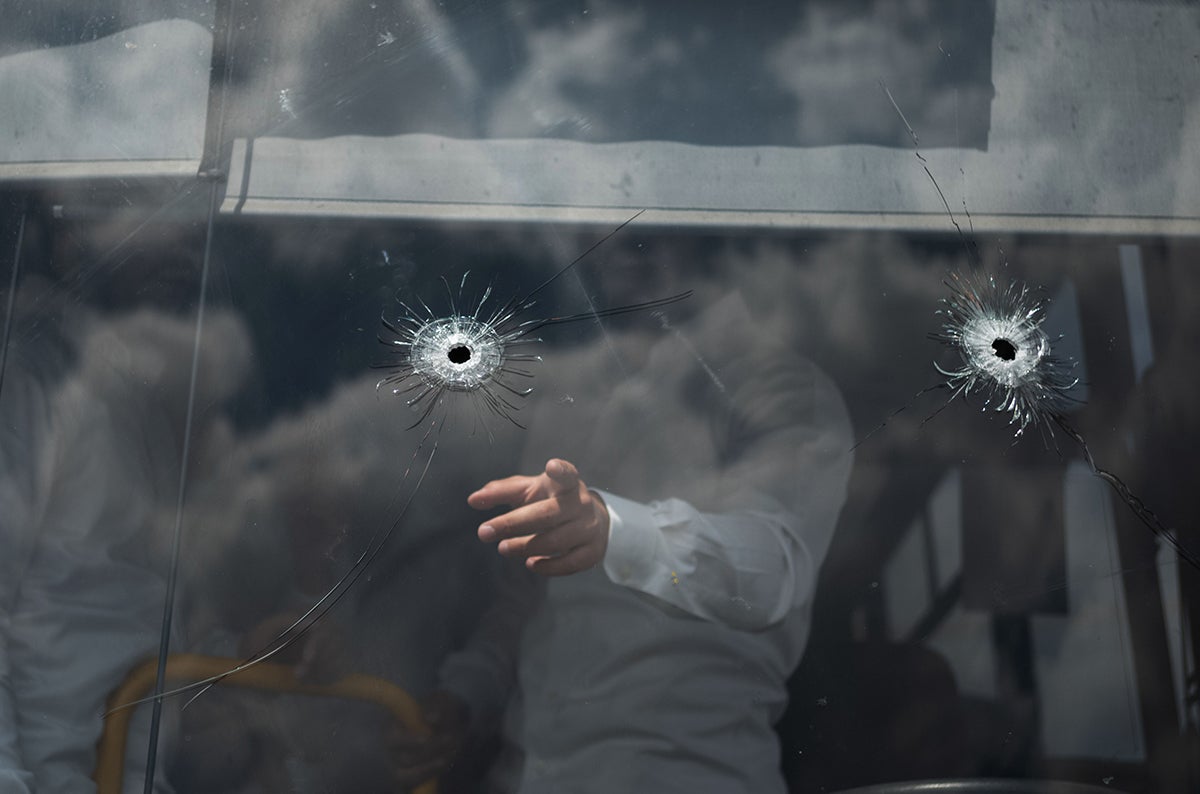 08 September 2025, Israel, Jerusalem: Gunshots are seen on a wind-shield of a bus at the bus stop where a shooting attack took place in Jerusalem. The Israeli emergency medical service reported that four victims were pronounced dead at the scene in north Jerusalem, while one died of her injuries later in hospital.